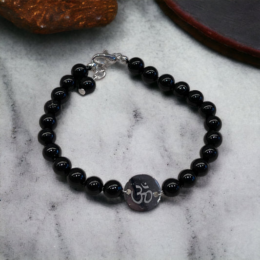 Black round bead bracelet with Silver Om symbol