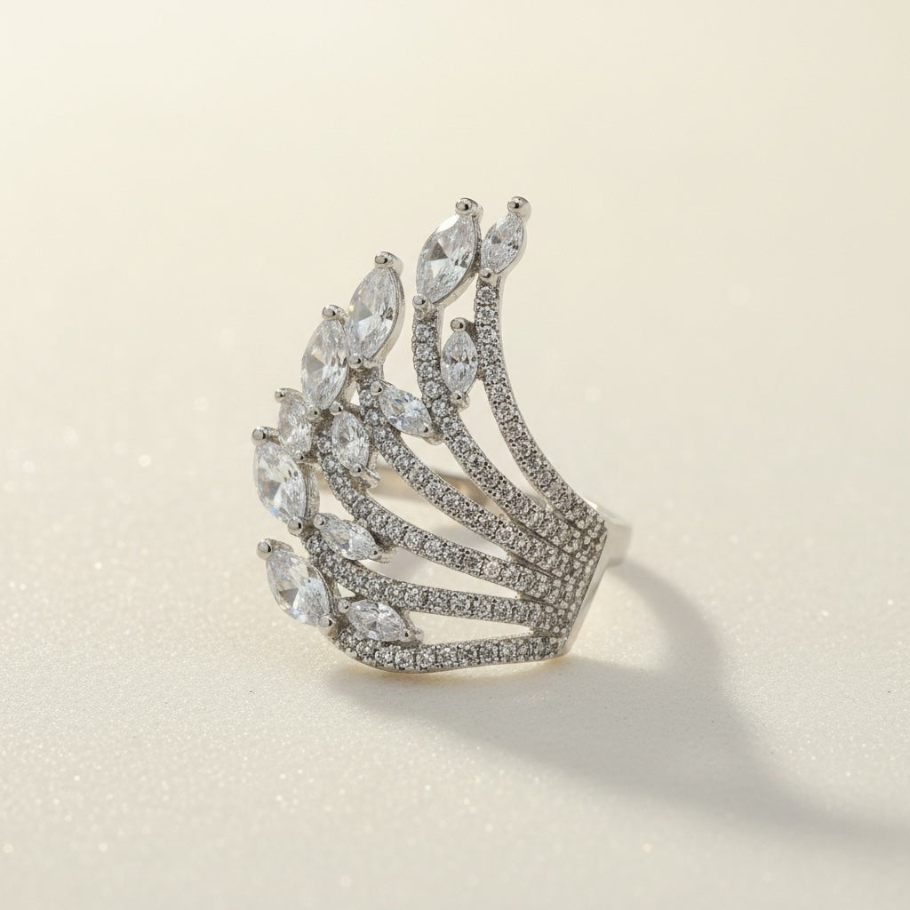 Riri Bespoke Jewelry fan-shaped statement ring in silver-tone with pavé-set stones and marquise-cut crystals.